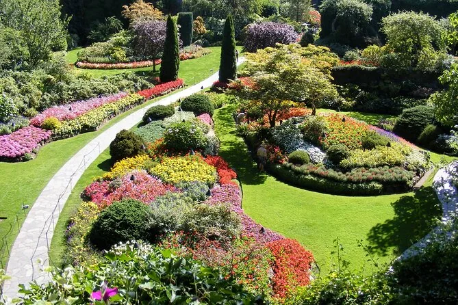 Colourful flowerbeds and a curving lawn in the Sunken Garden